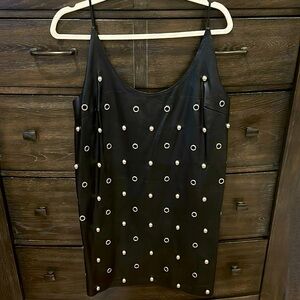 NWOT DO + BE faux leather dress never been worn with silver circle accents.